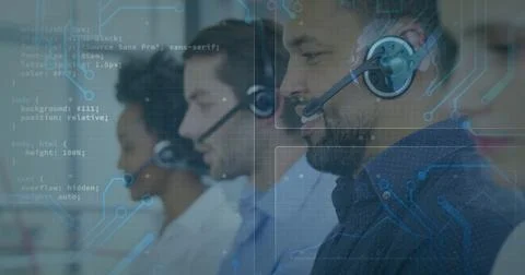 Call center agent in patterned shirt handling calls in office, headsets and 写真素材