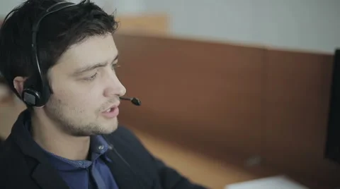 Call center agent speaking with costumer Stock Footage 56822528
