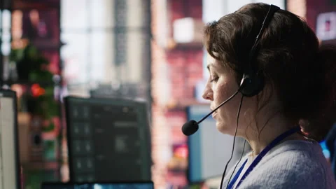 Call center agent uses artificial intelligence to enhance customer interactions Stock Footage 305393056