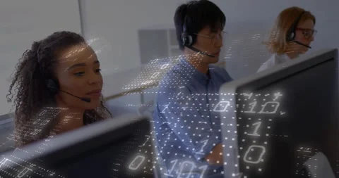 Call-center agents with mics typing while incoming calls driving binary grid Stock Footage 330426612