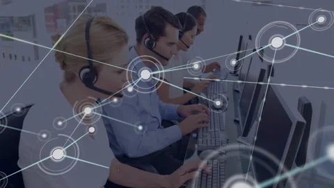 Call center agents typing as node graphic fading in connecting workstations for 스톡 동영상 312348536