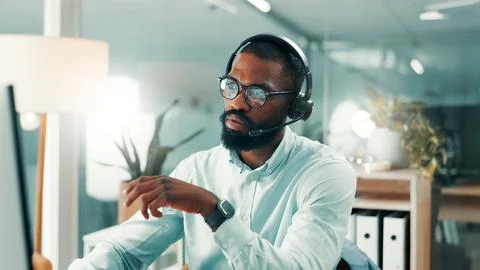 Call center, computer and black man in office, reading for system policy and Stock Photos