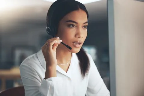 Call center, computer and problem solving with woman in telemarketing office for Stockfoto's