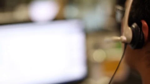 Call Center Employee with Headset Stock Footage 79426183