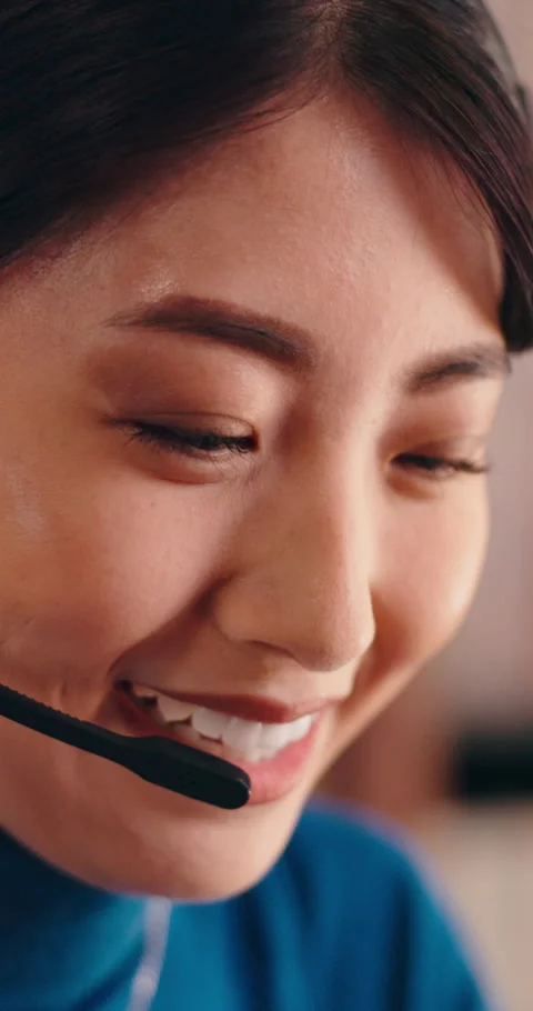 Call center, happy and agent with headset, contact us and telecom advisory with Stock Footage 340989384