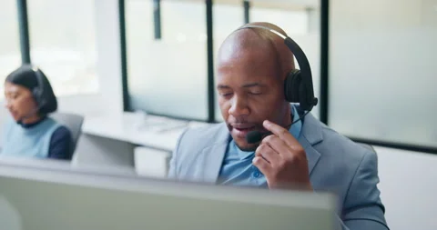 Call center, headset and black man with solution for customer support or Stock Footage 335787088