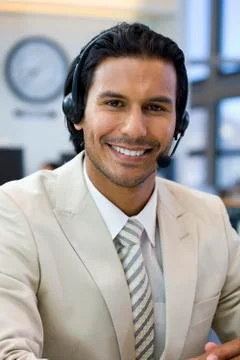 Call center operator in open space office Stock Photos