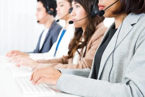 Call center (operator or telemarketer) team Stock Photos