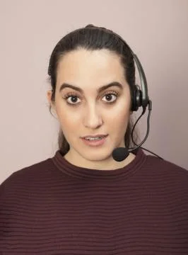 Call center operator with a surprised expression Stock Photos