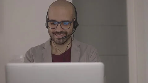 Call center operator is talking with headset. Customer service concept Stock-Footage 142372243