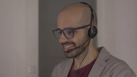 Call center operator is talking with headset. Customer service concept Stock-Footage 142372449