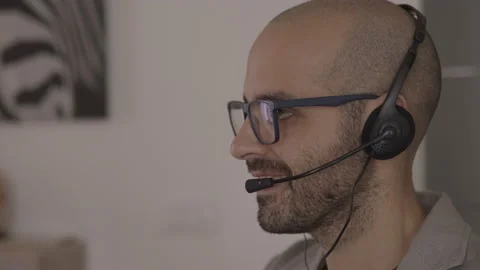 Call center operator is talking with headset. Customer service concept Stock Footage 142373123