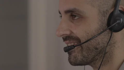 Call center operator is talking with headset. Customer service concept Stock-Footage 142373567