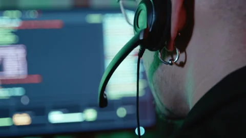 Call center operator working with code on computer screen Stock Footage 341658809