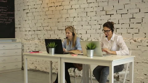 Call center operators communicating Stock Footage 57396495