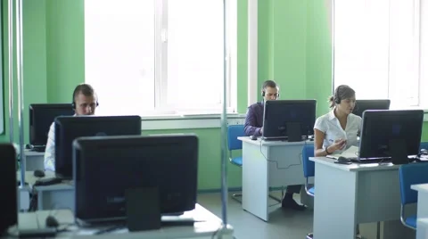 Call center operators at work Stock Footage 67667581