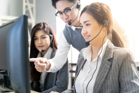 Call center supervisor teching Stock Photos