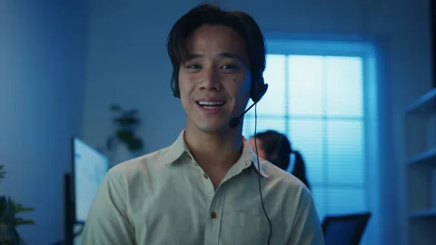 Call center team customer support service work support in night office. 動画素材 333943076