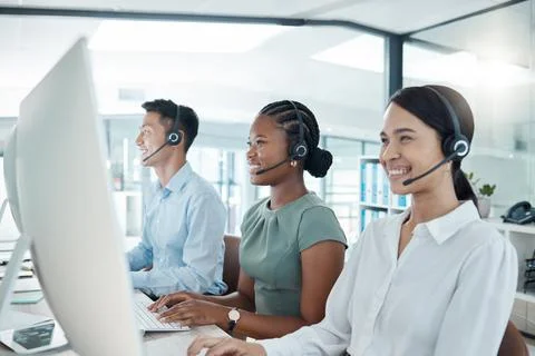Call center, telemarketing or customer support consultants working on computer Stock Photos