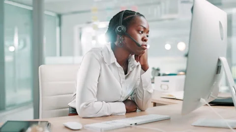 Call center, thinking and black woman in office bored for customer service Stock Footage 309049823