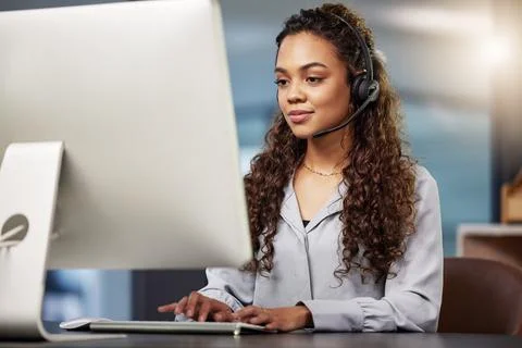Call center, virtual assistant or woman typing on computer at telecom customer Fotos de archivo