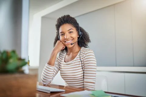 Call center, virtual assistant or portrait of friendly black woman in Fotos de archivo