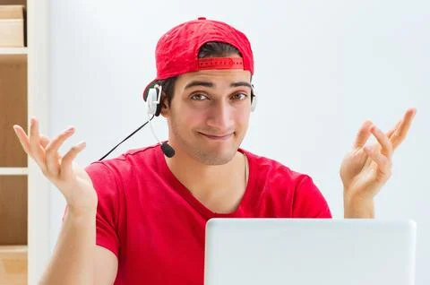 Call center worker at parcel distribution center in post office Stockfoto's