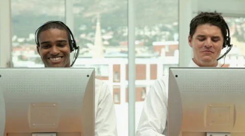 Call Center Workers Working at their Desks Stock Footage 853714
