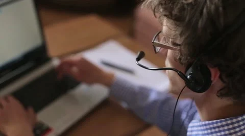 Call centre agent talking with a client Stock Footage 51859226