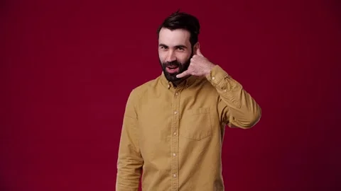 Call me! the guy shows the camera to call him Stock Footage 165620355