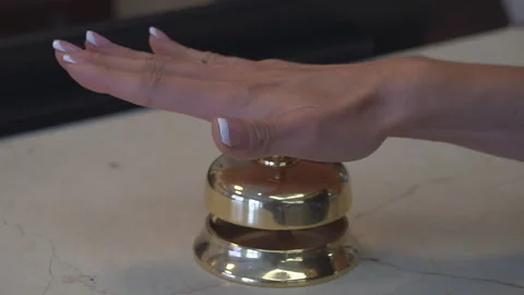 Call the reception. A woman's hand presses the bell. Close up Stock Footage 96470320