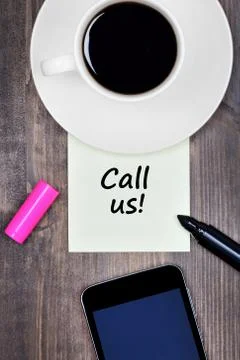 Call us word on notes Stock Photos