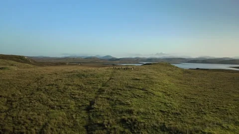 Callanish ll Stone Circle Drone Flyover with lakes behind, Scotland 4K Stock Footage 152748055