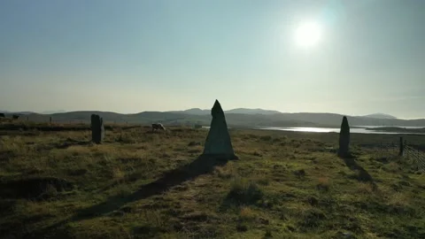 Callanish ll Stone Circle Drone Rising with lakes behind, Scotland 4K Stock Footage 152749566