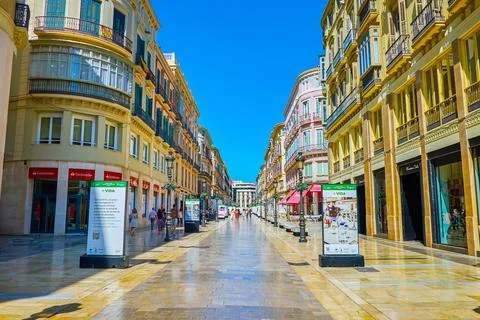 Calle Larios with Classical edifices, stores and restaurants, on September .. Stock Photos