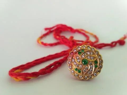 This is called "Rakhdi set". It is worn on the forehead, especially in Rajast Stock Photos