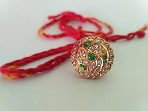 This is called "Rakhdi set". It is worn on the forehead, especially in Rajast Stock Photos