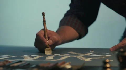 Calligrapher writes in white ink on dark paper. Calligraphy. Ornament Video stock 68313340
