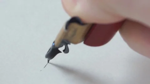 Calligrapher writing a word Stock Footage 76968302