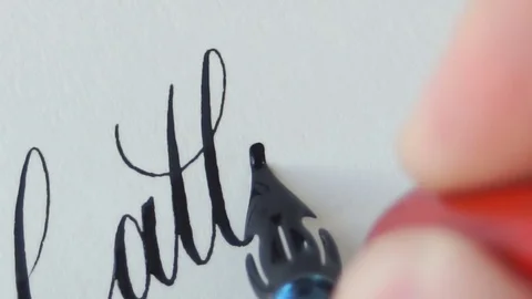 Calligrapher writing a word Stock Footage 76968559