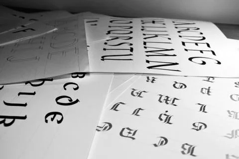 Calligraphic letters Stock Photos