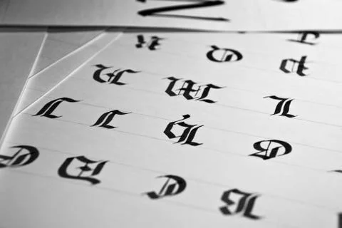 Calligraphic letters Stock Photos