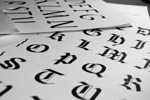 Calligraphic letters Stock Photos
