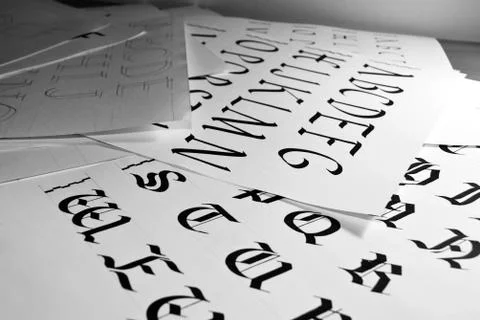 Calligraphic letters Stock Photos