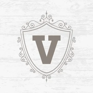 Calligraphic monogram emblem shield logo design template. Illustrazione stock