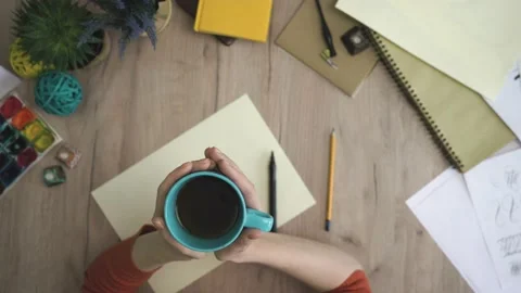 Calligraphy Drinking Coffee Waiting for Inspiration Stock Footage 148694499