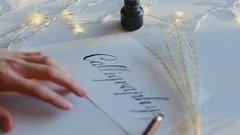 https://images.pond5.com/calligraphy-inscription-nib-pen-ant-footage-082079327_iconm.jpeg