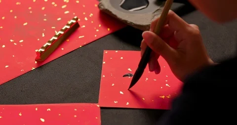 Calligraphy with red spring couplet Stock Footage 120589905