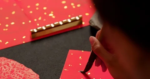 Calligraphy with red spring couplet Stock Footage 120592056