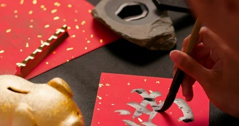 Calligraphy with red spring couplet Stock Footage 120669962